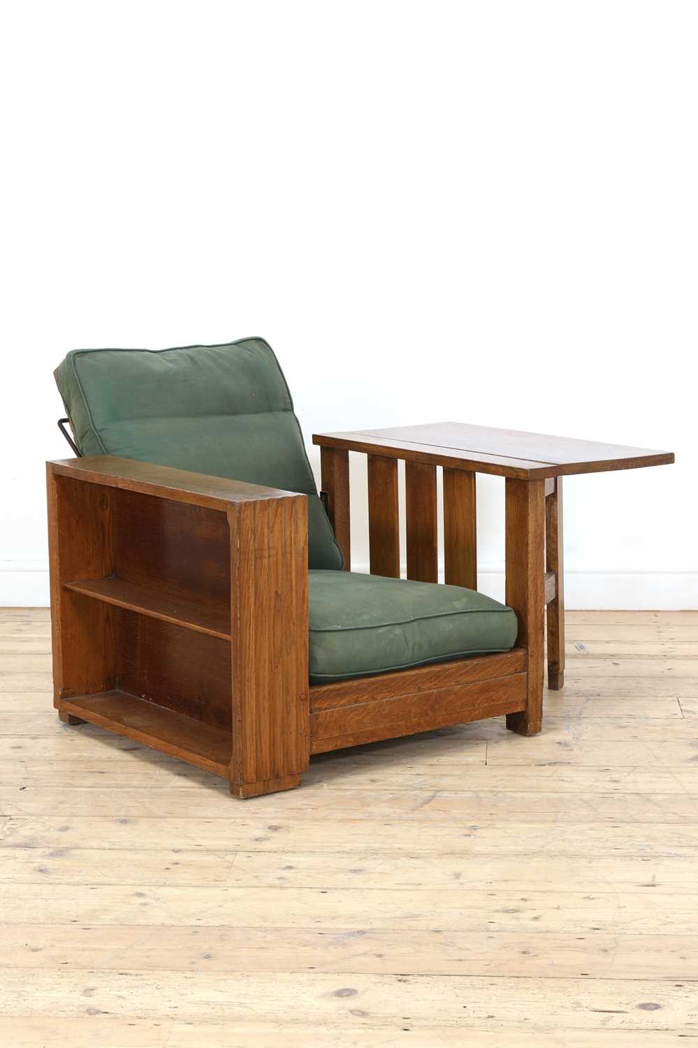 Lot 129 - An Heal's oak library chair