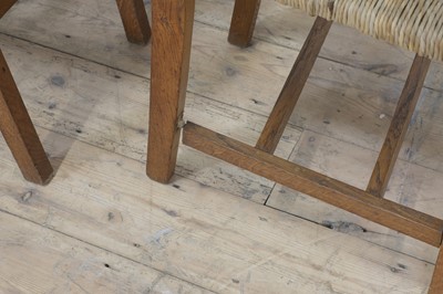 Lot 23 - A set of six rush seat chairs and an armchair