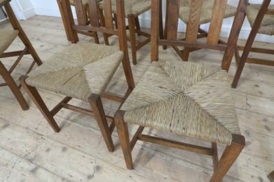 Lot 23 - A set of six rush seat chairs and an armchair