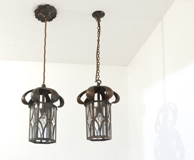 Lot 64 - A pair of Arts and Crafts copper hanging lanterns