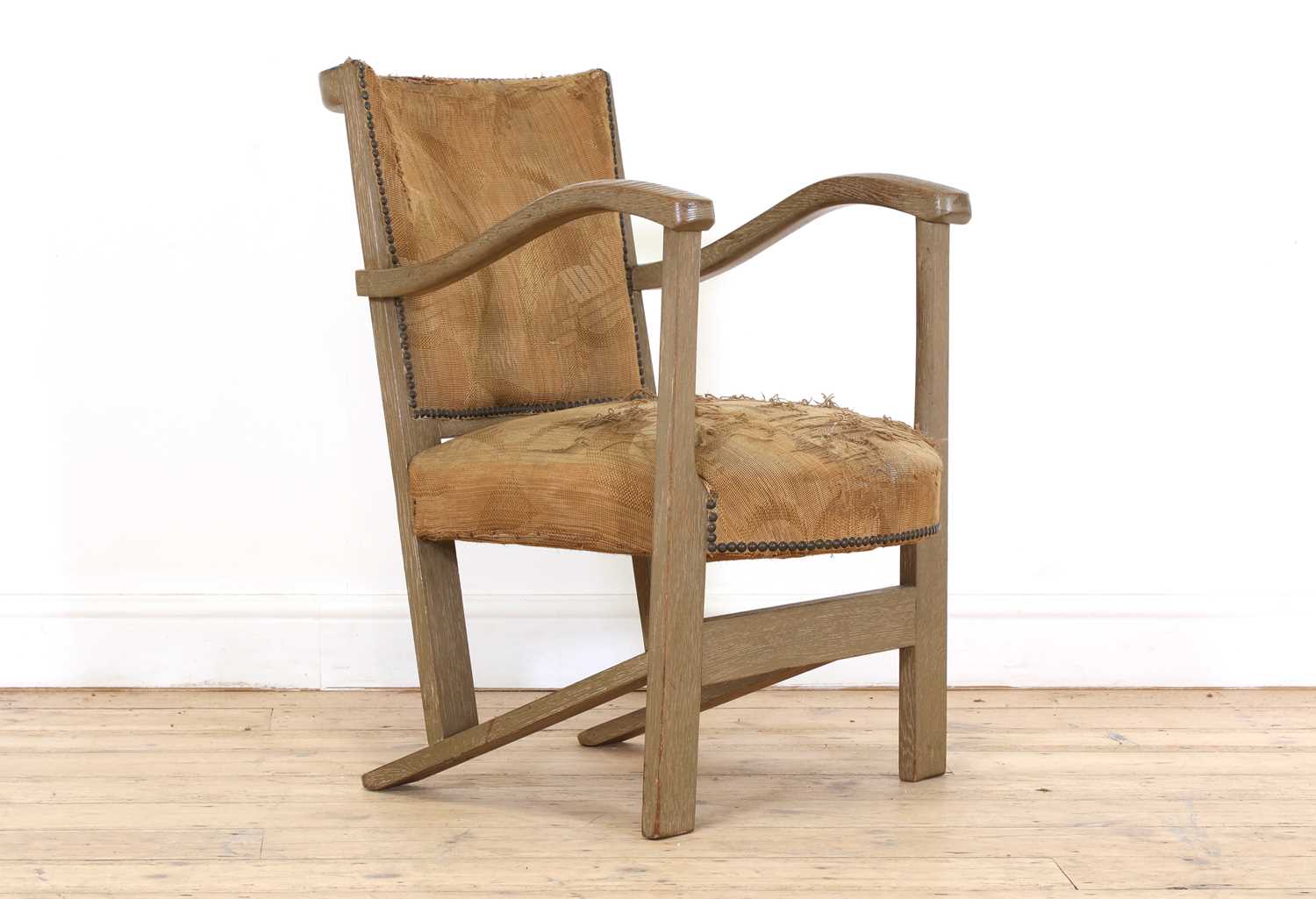 Lot 162 - A limed oak armchair