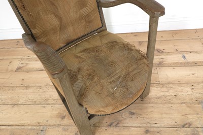 Lot 162 - A limed oak armchair