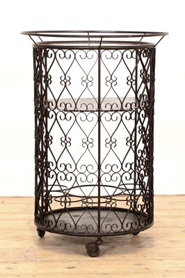 Lot 280 - A patinated metal bar cart