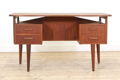 Lot 353 - A Danish teak desk