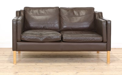 Lot 442 - A Stouby brown leather two-seater settee