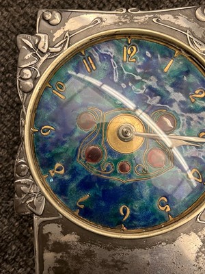 Lot 26 - A Liberty & Co. Tudric pewter and enamel mantel clock