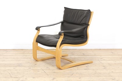 Lot 374 - A black leather and bentwood lounger