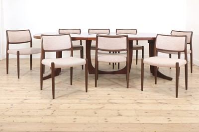 Lot 349 - A Danish teak dining table and chairs