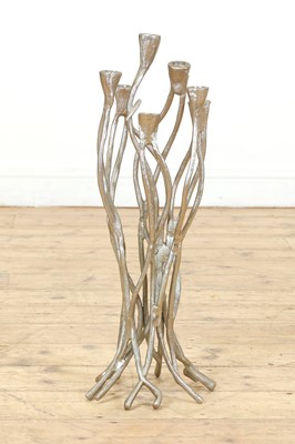 Lot 543 - A contemporary aluminium six-branch candelabra