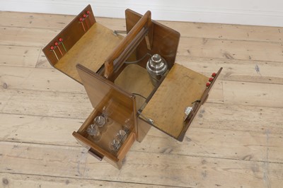 Lot 142 - An Art Deco portable walnut drinks cabinet