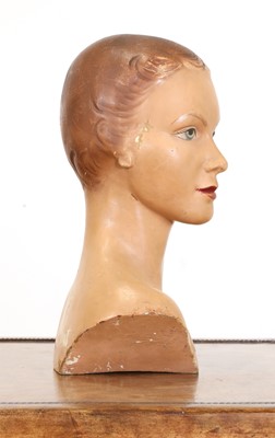 Lot 170 - A composition and painted advertising bust