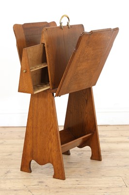 Lot 25 - An oak folio stand, book trough and pipe drawer