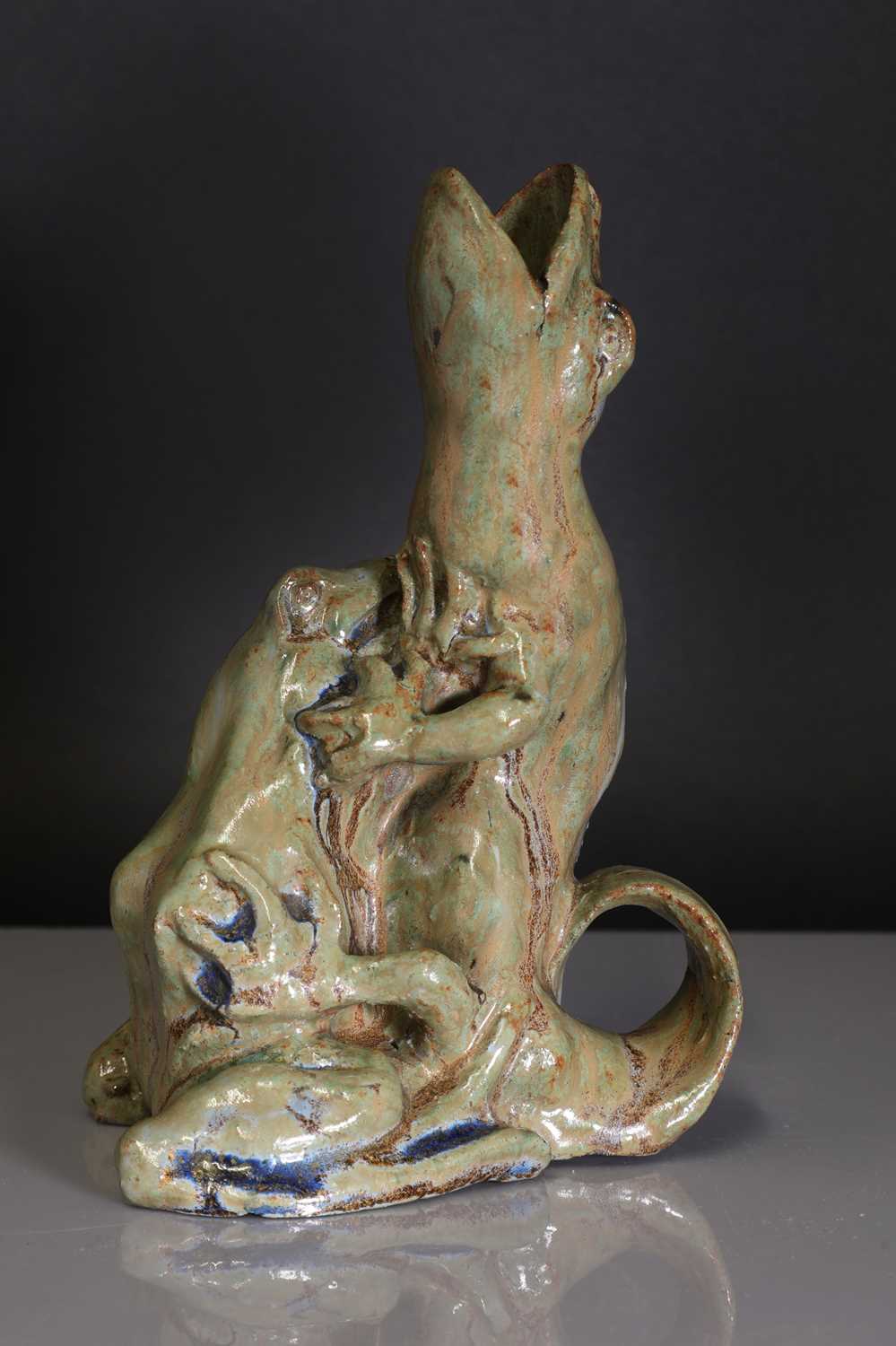 Lot 68 - A French glazed stoneware chamberstick