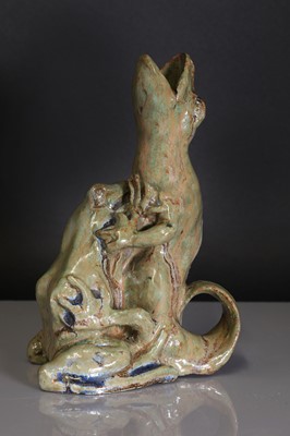 Lot 68 - A French glazed stoneware chamberstick