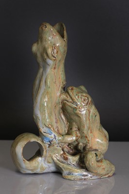 Lot 68 - A French glazed stoneware chamberstick