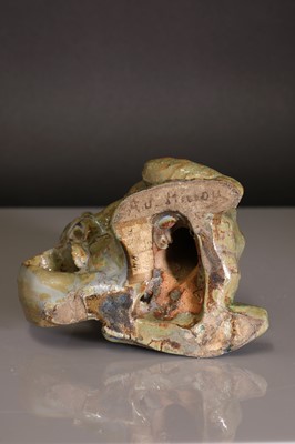 Lot 68 - A French glazed stoneware chamberstick