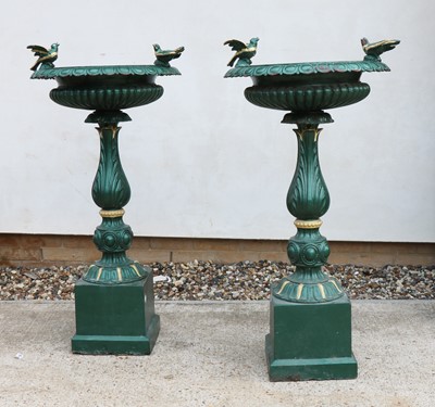 Lot 563 - A pair of English cast iron bird baths