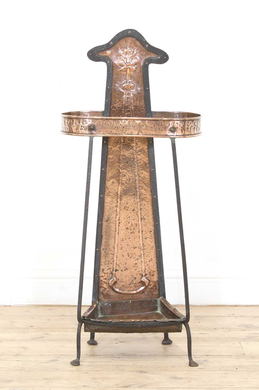 Lot 50 - An Arts and Crafts copper and wrought iron umbrella stand