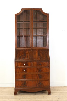 Lot 140 - An Heal's & Co. mahogany bureau bookcase