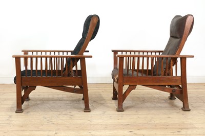 Lot 54 - Two similar Arts and Crafts oak loungers