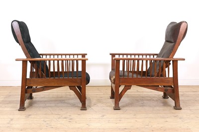 Lot 54 - Two similar Arts and Crafts oak loungers