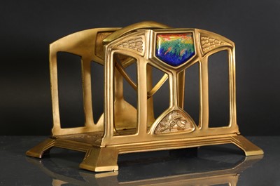 Lot 84 - An Arts and Crafts cast metal letter rack