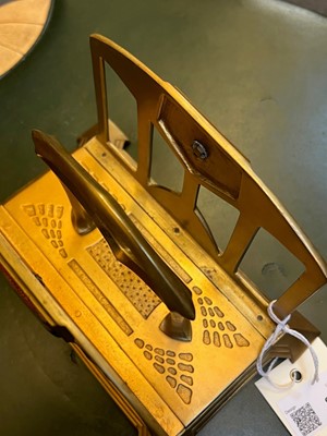 Lot 84 - An Arts and Crafts cast metal letter rack