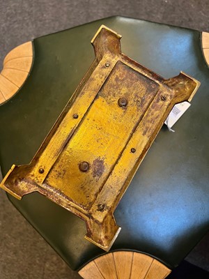 Lot 84 - An Arts and Crafts cast metal letter rack
