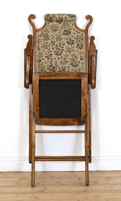 Lot 51 - An Arts and Crafts folding upholstered chair