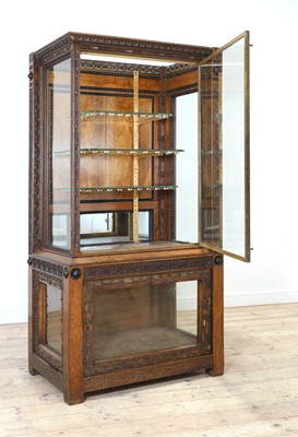 Lot 5 - An Aesthetic Movement walnut vitrine