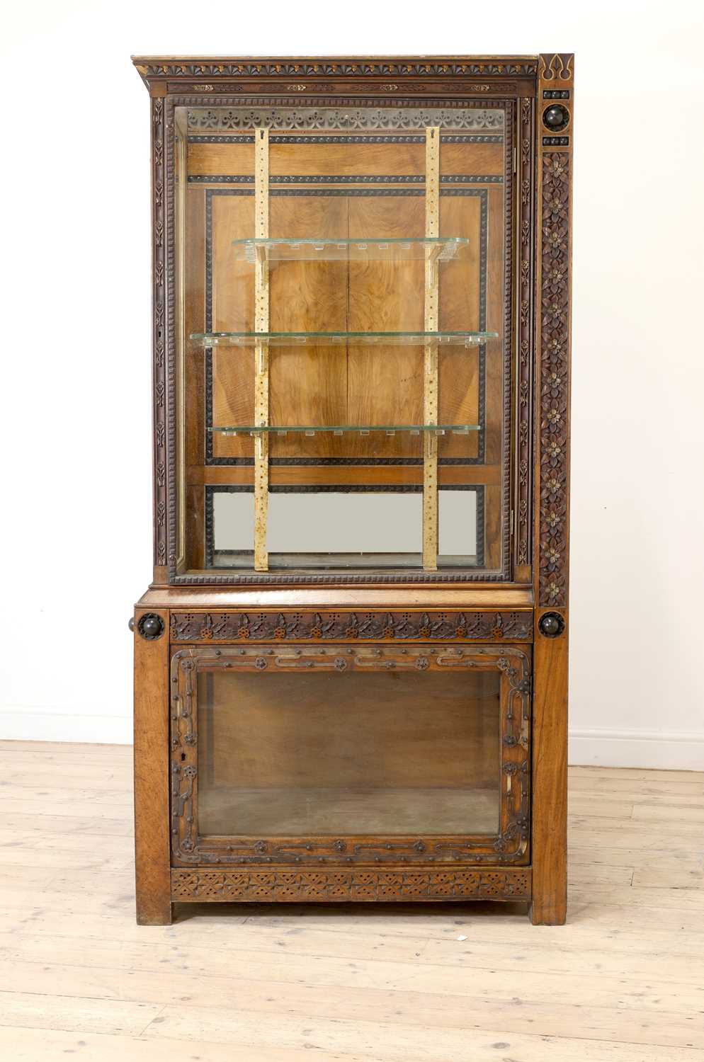 Lot 5 - An Aesthetic Movement walnut vitrine