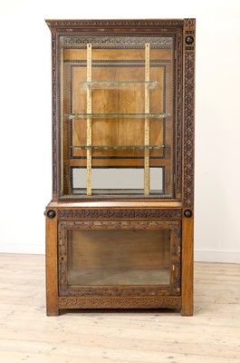 Lot 5 - An Aesthetic Movement walnut vitrine