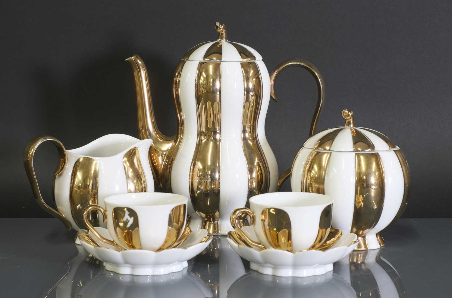 Lot 135 - An Austrian Augarten 'Melon' mocha set