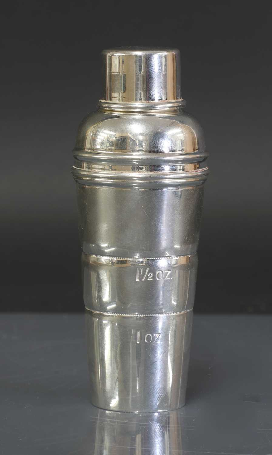 Lot 110 - A silver-plated cocktail stick, measure and funnel by P H Vogel