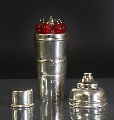 Lot 110 - A silver-plated cocktail stick, measure and funnel by P H Vogel