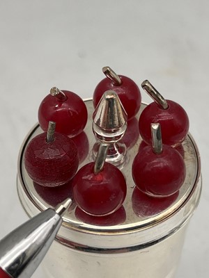Lot 110 - A silver-plated cocktail stick, measure and funnel by P H Vogel