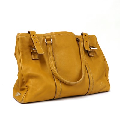 Lot 316 - A Prada Vitello Daino tan leather buckle tote