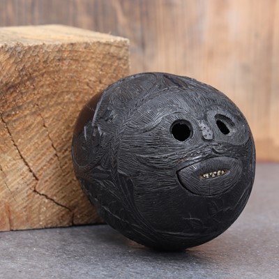 Lot 488 - A 'bugbear' coconut