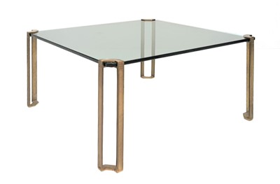 Lot 542 - A brass and glass low coffee table