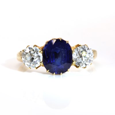 Lot 89 - A gold sapphire and diamond three stone ring, c.1900