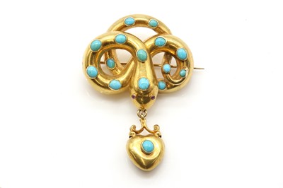 Lot 33 - A Victorian ruby and turquoise set snake or serpent knot style brooch