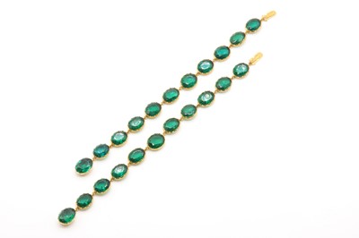 Lot 71 - A pair of Victorian gold and green paste set rivière style bracelets