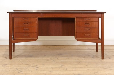 Lot 407 - A Danish teak desk