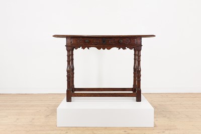 Lot 60 - A walnut side table
