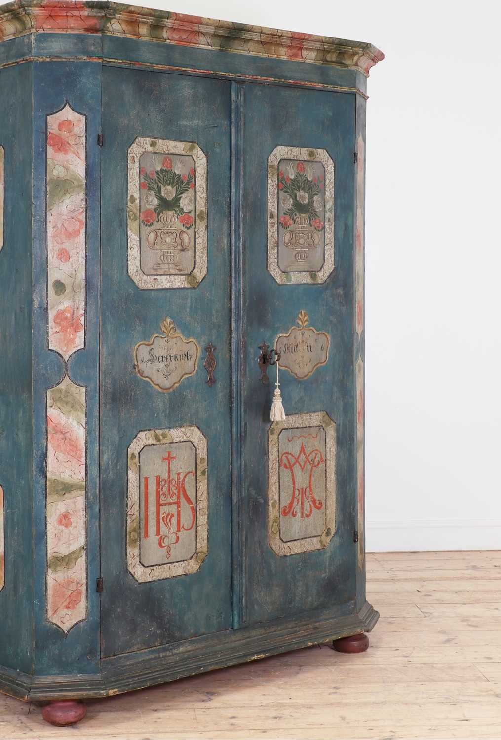 Lot 55 - A painted pine marriage cabinet