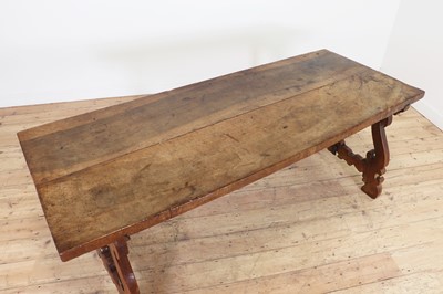 Lot 49 - A walnut and wrought iron table