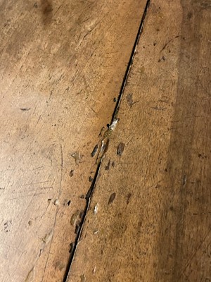 Lot 49 - A walnut and wrought iron table