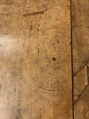 Lot 49 - A walnut and wrought iron table