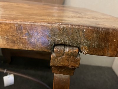 Lot 49 - A walnut and wrought iron table