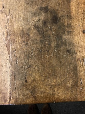 Lot 49 - A walnut and wrought iron table